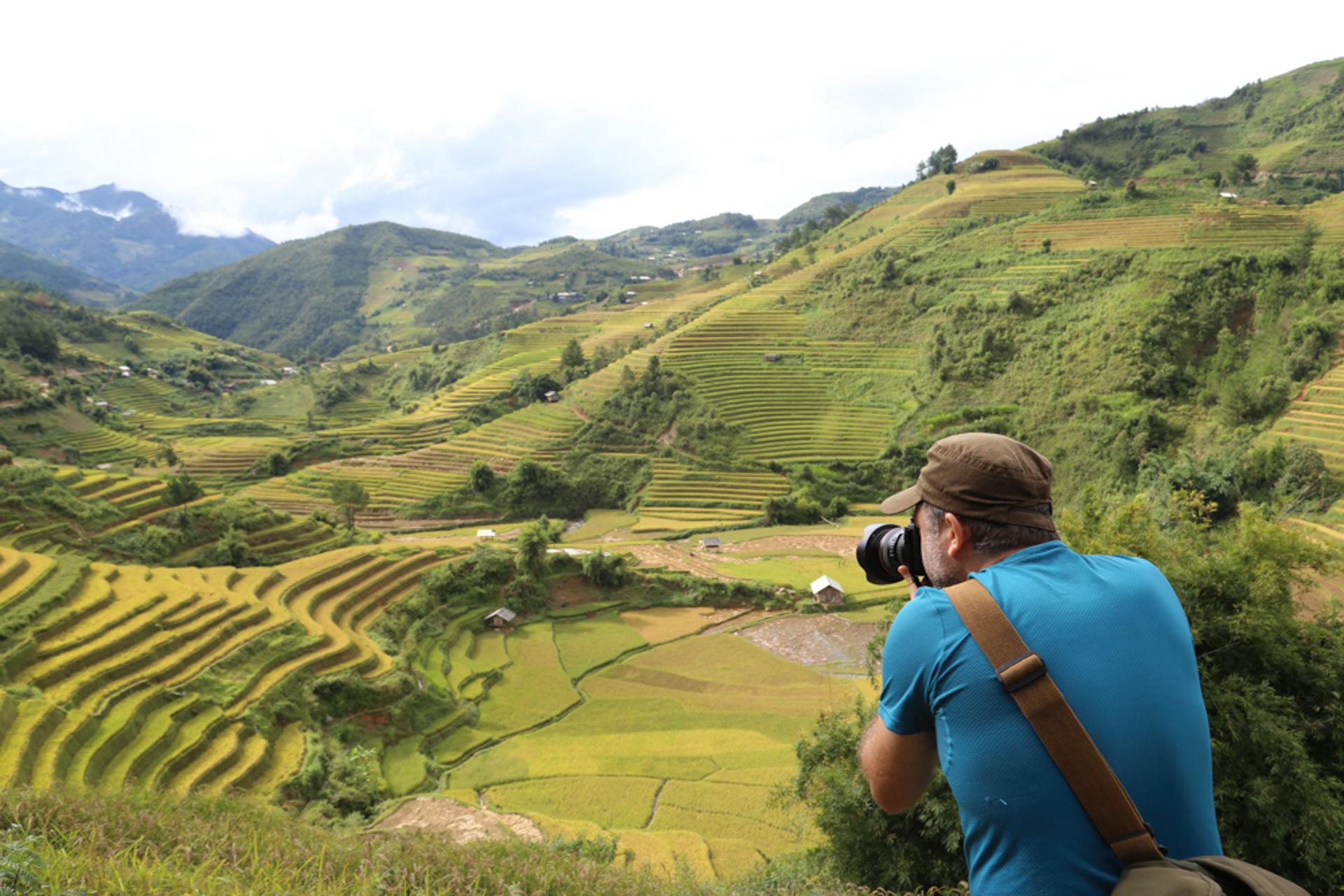 Photographe dans les rizières en terrasses de Mu Bang Chai